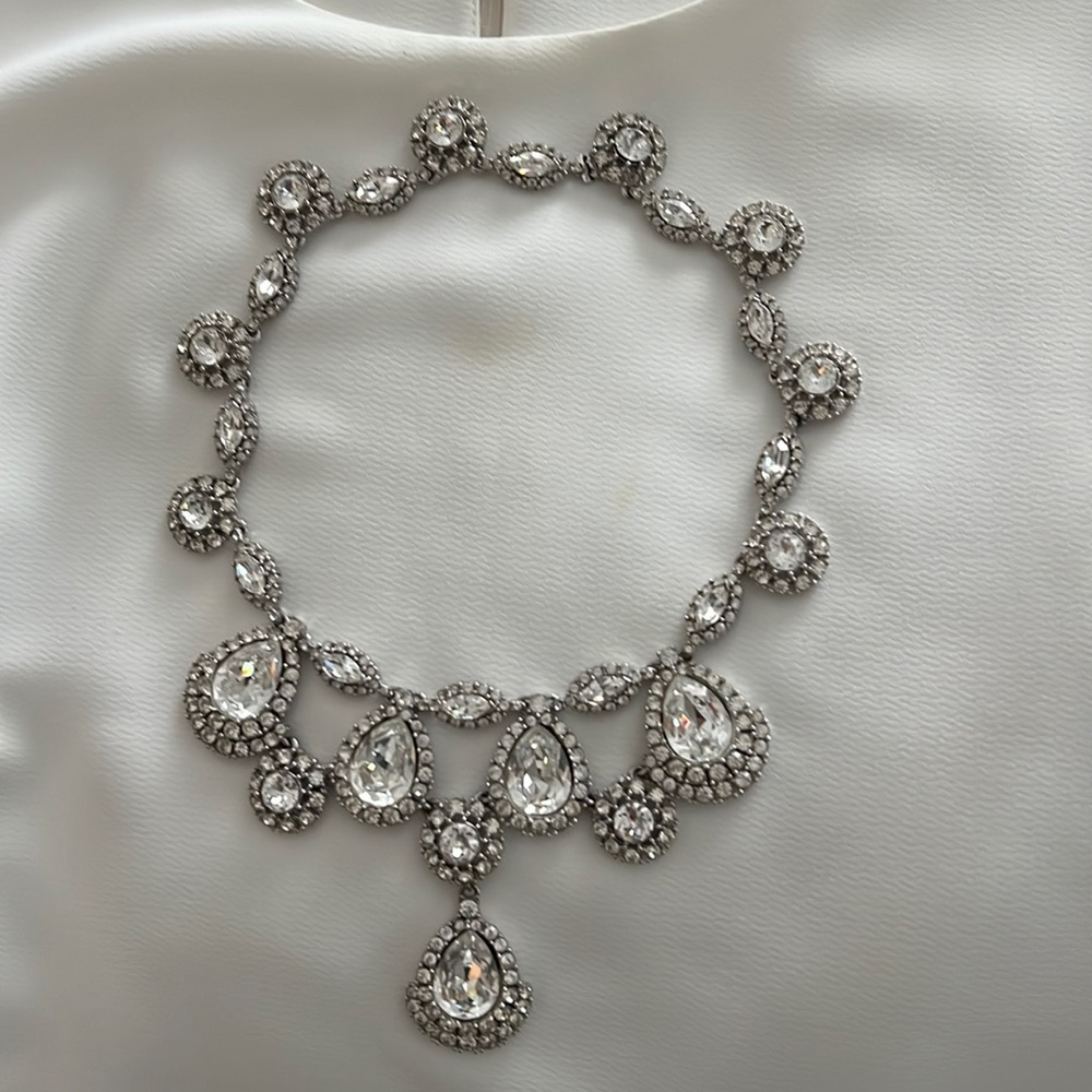Super high end custom jewelry! Gorgeous rhinestone, invisible clasp. I